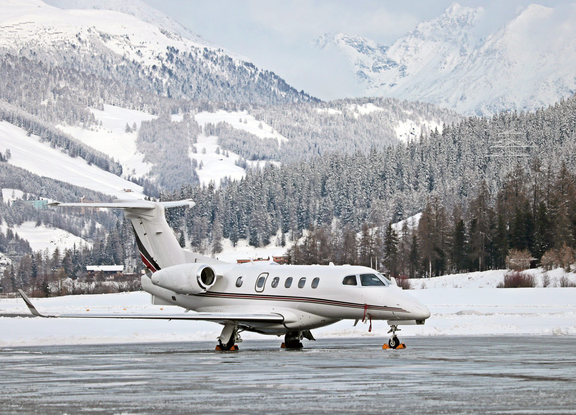 airplane on runway in mountains