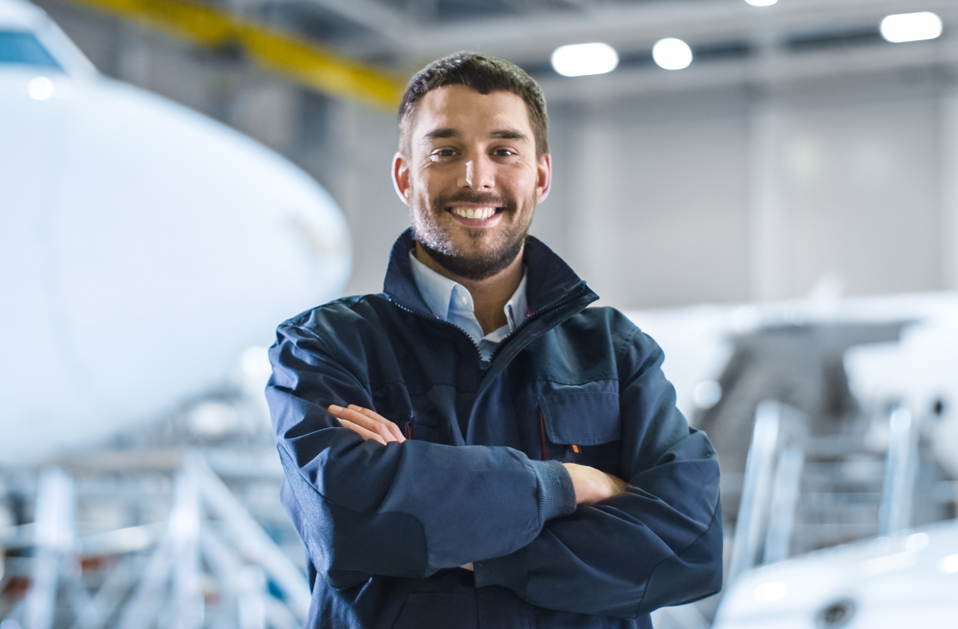 Business Owner and Aircraft in Maintenance Hangar