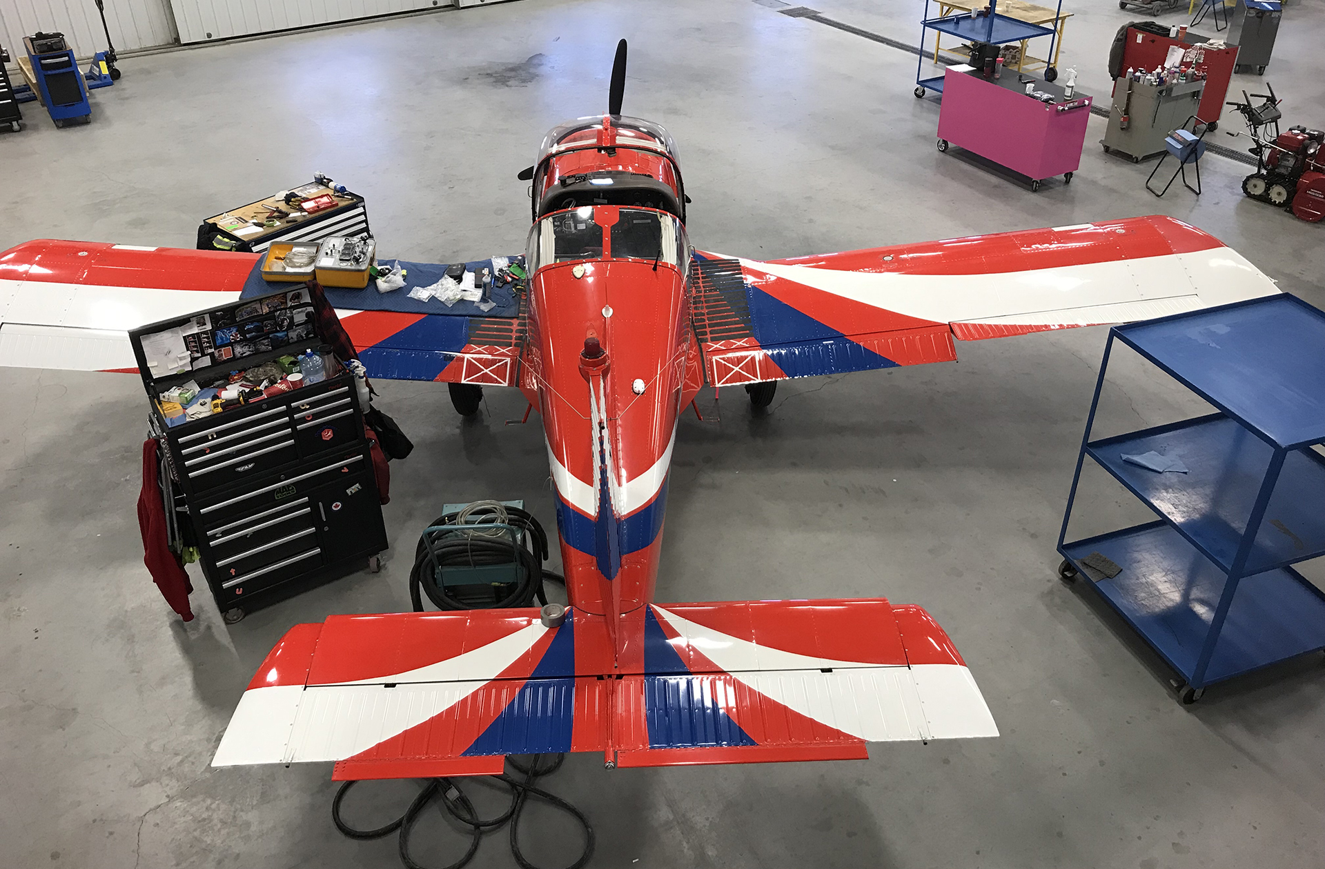 A Zlín Z-242L Aircraft Undergoes Routine Maintenance at Sault College's Hangar
