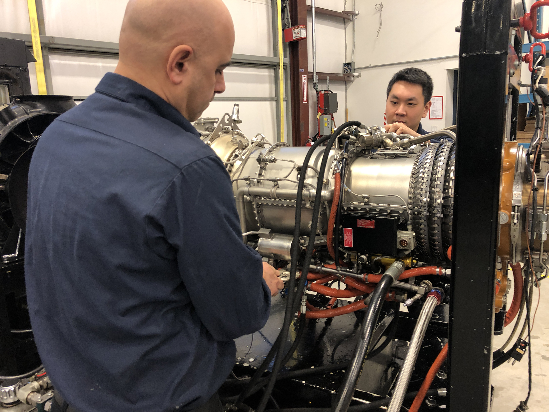 Staff facilitate engine maintenance at Advance Aerospace's maintenance facility